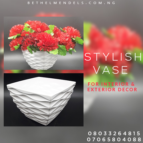 Read more about the article Red Artificial flower with A white Vase