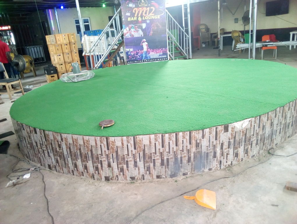 You are currently viewing Event Stage DecorateAd with Artificial Grass in Sango, Ota, Ogun State.